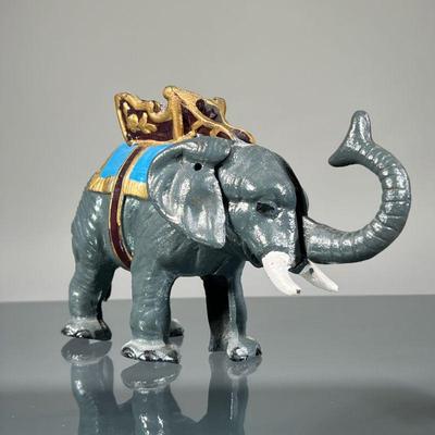 ELEPHANT CAST IRON MECHANICAL BANK | Paint decorated. - h. 5.25 x l. 7.75 in

