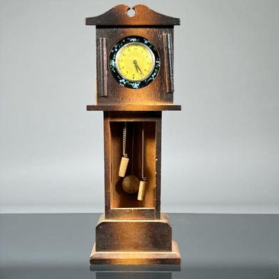 INGRAHAM POCKET WATCH & SAFE | Paint decorated enameled pocket watch case, in a grandfather clock-form watch safe. - h. 7.75 x w....