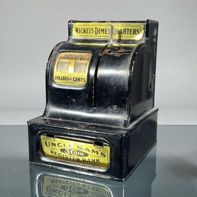 TIN REGISTER STILL BANK | Uncle Sam’s Register Bank | h. 6.25 x w. 4.5 x d. 5.25 in

