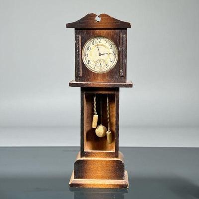 HOWARD POCKET WATCH & SAFE | A Howard gold-tone cased pocket watch with engraved decoration to case and dial, having Arabic numeral...