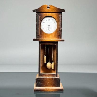 LAFORGE & VALENTINE WATCH & SAFE | A Laforge & Valentine pocket watch in a metal case, the face signed and having Arabic...