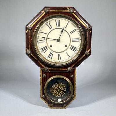 GRAIN-PAINTED OCTAGONAL WALL CLOCK | Octagonal face with Roman numeral markers. - h. 21.5 x w. 13.5 x d. 5 in


