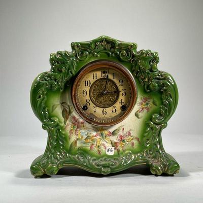 GILBERT PORCELAIN MANTEL CLOCK | Green glazed porcelain shelf clock by W.M.I Gilbert Clock Co. 1903 No. 411. - h. 11.5 x w. 5 x l. 12 in


