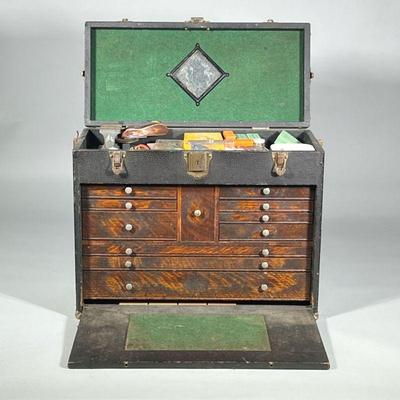 CLOCKMAKER'S TOOL CHEST | Fall front fitted with oak drawers, filled with tools, pocket watches, wristwatches, various pocket and...