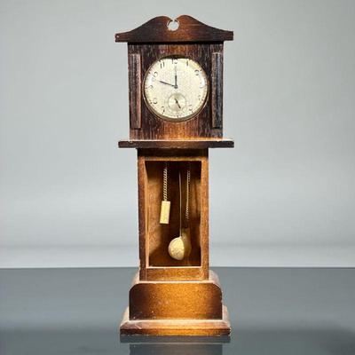 ELGIN POCKETWATCH & SAFE | An Elgin pocket watch with engraved silver-tone case, monogrammed on verso, the face with Arabic numerals...