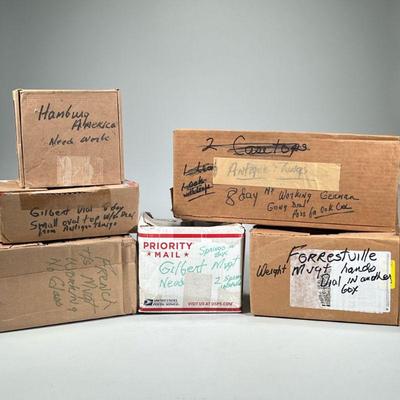 (6pc) MISC. CLOCK PARTS | Six boxes of assorted clock parts, including boxes labeled "French Mvgt", "Hamburg...