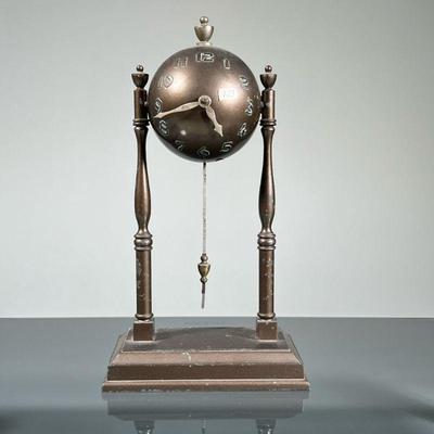 GLOBE WORLD'S FAIR CLOCK | c. 1939, Globe Clock Company World's Fair spherical clock. - h. 9.5 x w. 5.25 x d. 3 in

