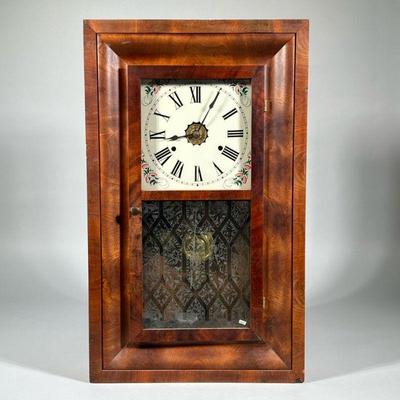 SETH THOMAS SHELF CLOCK | Thomaston, Mass., with decorated glass panel, veneered case. - h. 25.25 x w. 15.25 x d. 4 in


