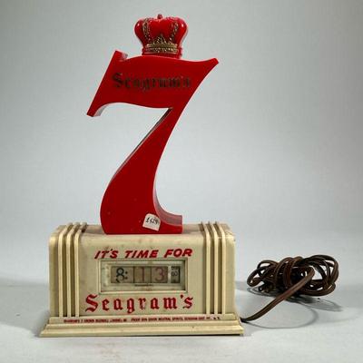 SEAGRAM’S CLOCK | Digital clock with rotating numerals, with Seagram's crowned 7. - h. 12.25 x w. 7.75 x d. 4 in

