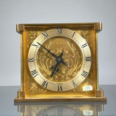 HOUR LAVIGNE BRASS DESK CLOCK | "JUST" by Hour Lavigne brass desk clock, made in France, with engraved face and Roman numeral...