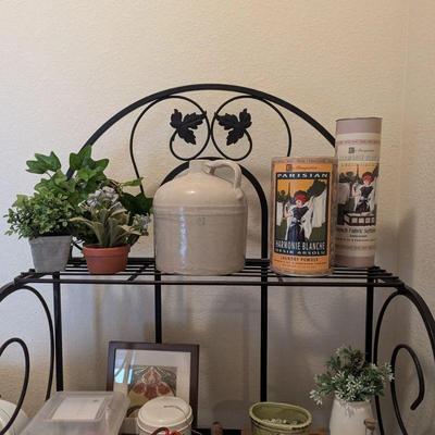 Metal plant stand, pottery, faux plants