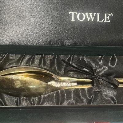 Towel silver salad tongs
