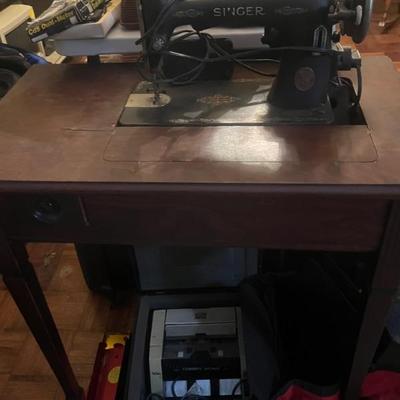 Vintage Singer sewing machine with cabinet 