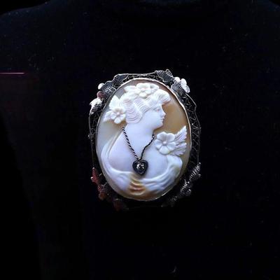 Gold cameo with diamond