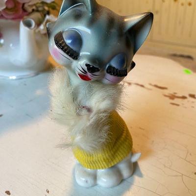 Vintage big eyelashes cat with yellow sweater. RARE
Bradley Exclusives.  Made in Japan