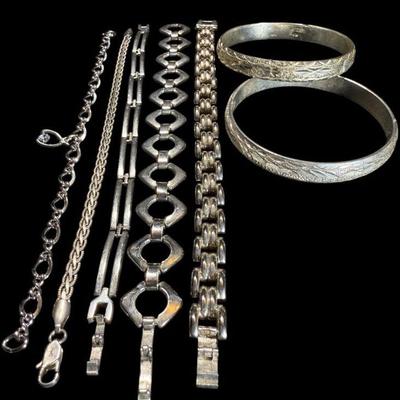 TN65 Sterling Silver Stamped 925 Bracelets- 7 In Total	Total weight approximately 134.79 grams
