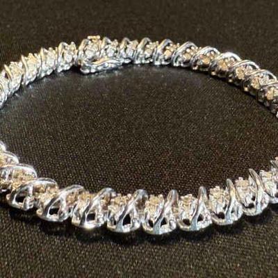 TN62 NAGL Certified 10k White Gold & Diamond Bracelet, 2CtW	See certificate for information
