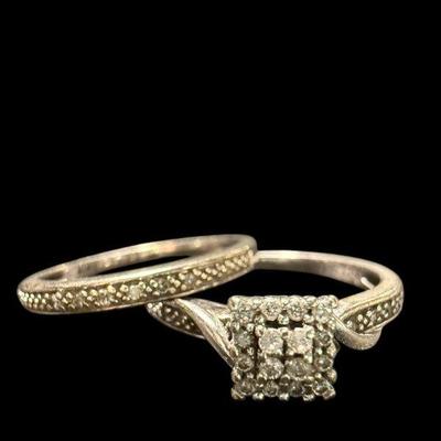 TN60 NAGL Certified 10k White Gold & Diamond Wedding Set, .24CTW	Size 6.5 See certificate for additional information
