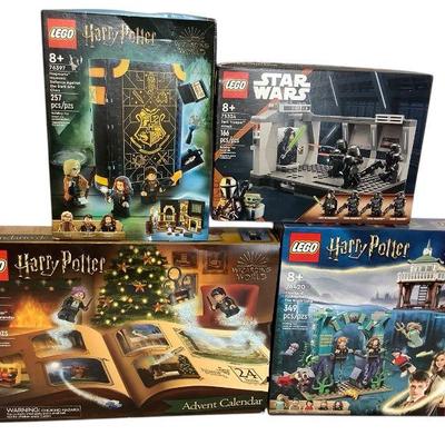 TN139 NEW Lego Harry Potter And Star Wars Ages 7 And 8	Three boxes have creases. Star Wars box has small tear.
