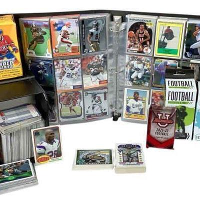 TN217 Factory Sealed Collector Card Assortment	All different kind of sport cards and G.I Joe trading cards.
