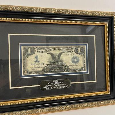 TN31 Framed 1899 1$ Silver Certificate “The Black Eagle”	Frame measures 15"x11" Gilt wood frame, matted. 
