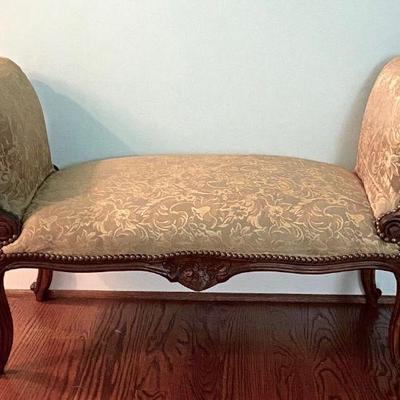 roll arm bench with carved wood