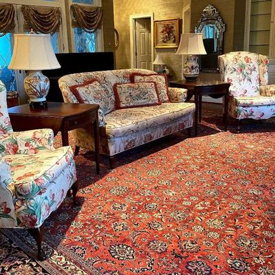 Pair of wing back chairs in tulip motif fabric, pair of side tables, Stickley sofa with 3 pillows, & ceramic lamps.