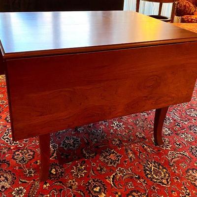 Cherry drop leaf table by Gat Creek.