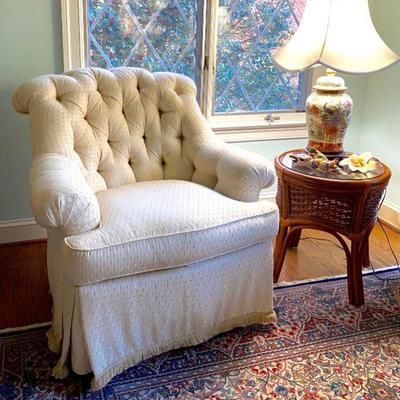 Sherrill tufted chair, rattan side table, and Asian style ceramic lamp.