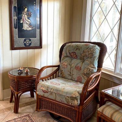 One of two wood panels depicting Japanese dancers, Palm Springs Rattan swivel rocking chair & glass top side table.