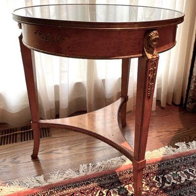Verdi marble top round table. Wood frame with brass decorations - 26" diameter.