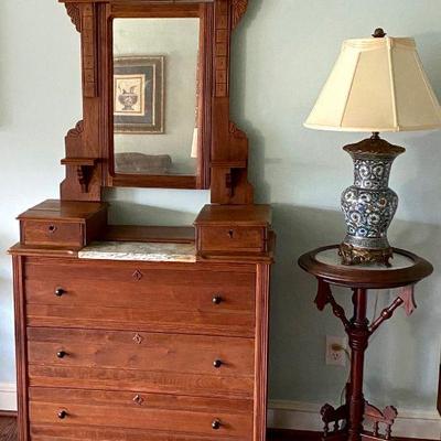 Antique Eastlake oak dresser with marble & mirror, Eastlake fern stand with marble top, and ceramic lamp.