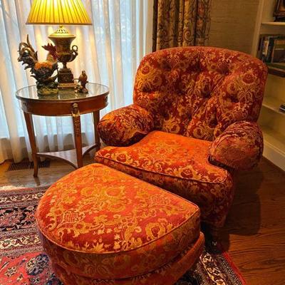 Sherrill club chair & ottoman, round marble top table with brass decoration, and ceramic lamp.