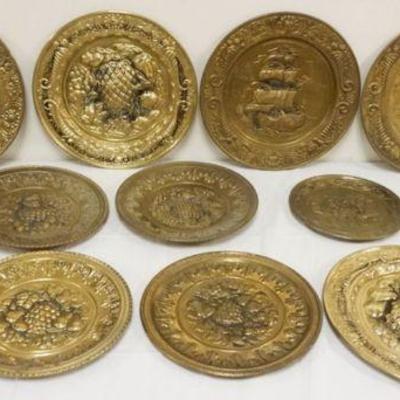 1248	LARGE GROUP OF ASSORTED BRASS WALL CHARGERS INCLUDING IMAGES OF SHIPS, TAVERNS, ETC., LARGEST APPROXIMATELY 14 IN
