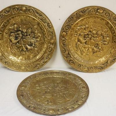1252	GROUP OF LARGE BRASS EMBOSSED CHARGERS, INCLUDING 1 PAIR, TAVERN SCENES, APPROXIMATELY 28 1/2 IN
