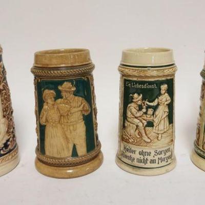 1199	GROUP OF 4 VINTAGE GERMAN STEINS, TALLEST APPROXIMATELY 7 1/2 IN HIGH
