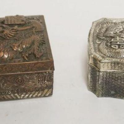 1055	2 AIAN EMBOSSED METAL TRINKET/DRESSER BOXES W/IMAGES OF DRAGONS, LARGEST APPROXIMATELY 3 1/2 IN X 5 IN X 2 IN HIGH
