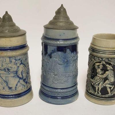 1202	GROUP OF 3 VINTAGE GERMAN STEINS, TALLEST APPROXIMATELY 8 1/2 IN HIGH
