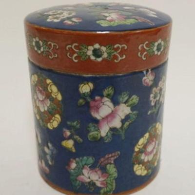 1036	ASIAN PORCELAIN ROUND CONTAINER W/IMAGES OF FLOWERS & CHARACTER MARKS ON BASE, APPROXIMATELY 5 1/2 IN X 6 1/4 IN HIGH
