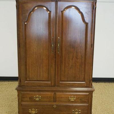 Sale Photo Thumbnail #153: 1154	PENNSYLVANIA HOUSE CHERRY WARDROBE W/2 DOORS OVER 2 DRAWERS, INTERIOR ADJUSTABLE SHELVES & MIRROR & TIE RACK, APPROXIMATELY 39 IN X 19 IN X 66 IN HIGH
