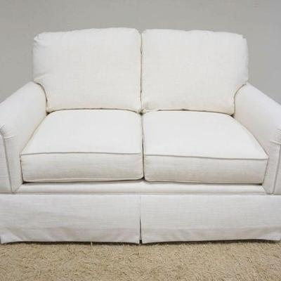 1160	BASSET IVORY UPHOLSTERED LOVESEAT, APPROXIMATELY 59 IN X 39 IN X 30 IN HIGH

