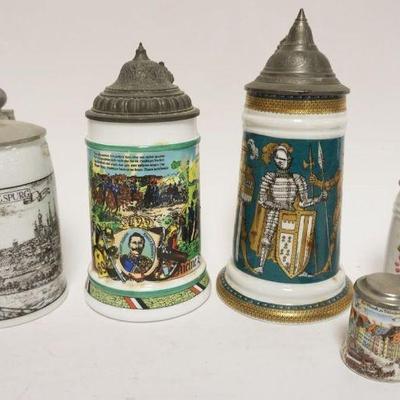 1201	GROUP OF 5 VINTAGE GERMAN STEINS, TALLEST APPROXIMATELY 9 1/2 IN HIGH
