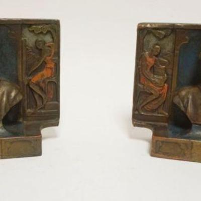 1042	PAIR OF BRONZE WRAPPED BOOKENDS *DANTE* APPROXIMATELY 7 IN X 5 1/4 IN HIGH
