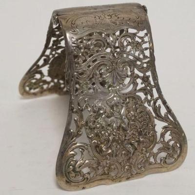 1063	ANTIQUE 860 SILVER ASPARAGUS TONGS W/EMBOSSED CHERUBS, STAMPED WSH, 5.30 OZT
