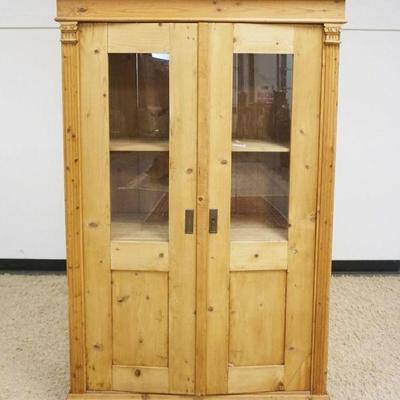 1140	COUNTRY SCRUB PINE 2 DOOR CABINET W/2 INTERIOR SHELVES & REEDED COLUMN SIDES, APPROXIMATELY 48 IN X 20 IN X 71 IN HIGH
