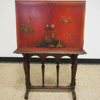 1135	ASIAN 2 DOOR LACQUERED CABINET W/RELIEF IMAGES OF PEOPLE, TEMPLES & BIRDS, APPROXIMATELY 27 IN X 16 IN X 41 IN HIGH
