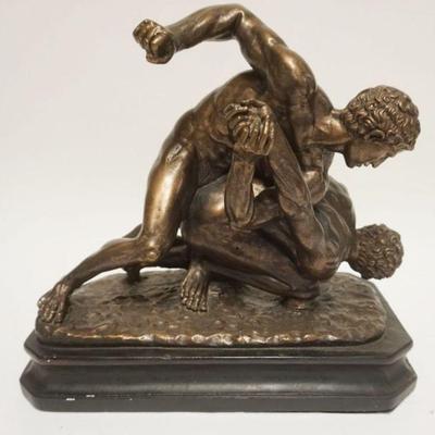 1041	CHALK STATUE IN BRONZE FINISH OF MEN WRESTLING, APPROXIMATELY 15 IN X 9 IN X 15 IN HIGH
