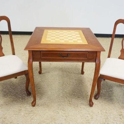 1153	CHERRY GAME TABLE W/2 QUEEN ANNE STYLE CHAIRS W/MULTIPLE GAME BOARDS INCLUDING CHECKERS, BACKGAMMON, MONOPOLY & SCRABBLE, TABLE...