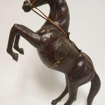 1040	LEATHER PRANCING HORSE, APPROXIMATELY 14 IN X 23 IN HIGH

