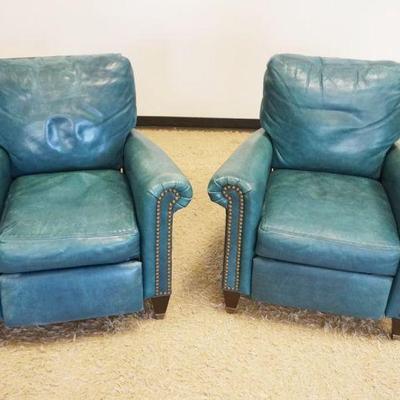 1115	PAIR OF TUQUOISE LEATHER RECLINERS
